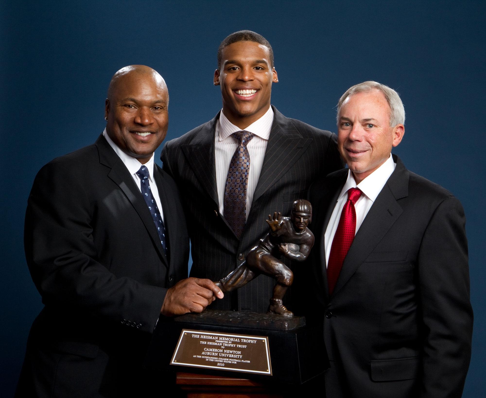 Auburn Heisman Trophy winners from left to right: Bo Jackson, Cam Newton and the late Pat Sullivan.