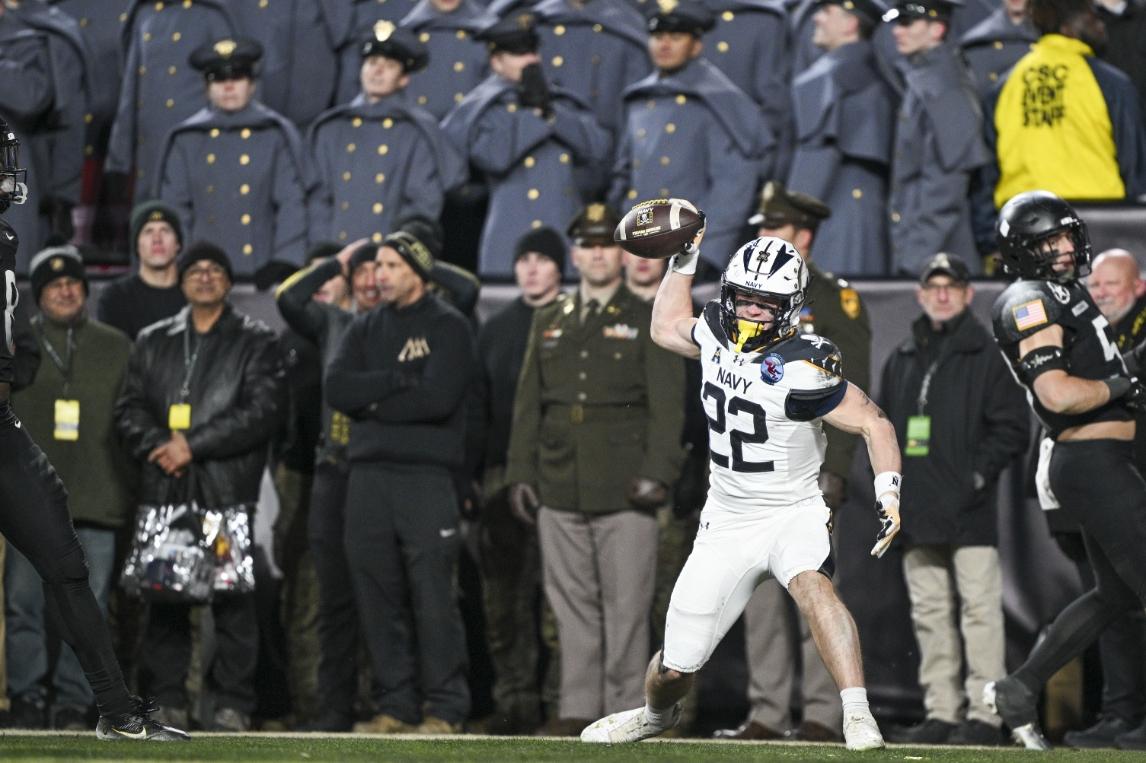 Navy celebrates touchdown in win over Army