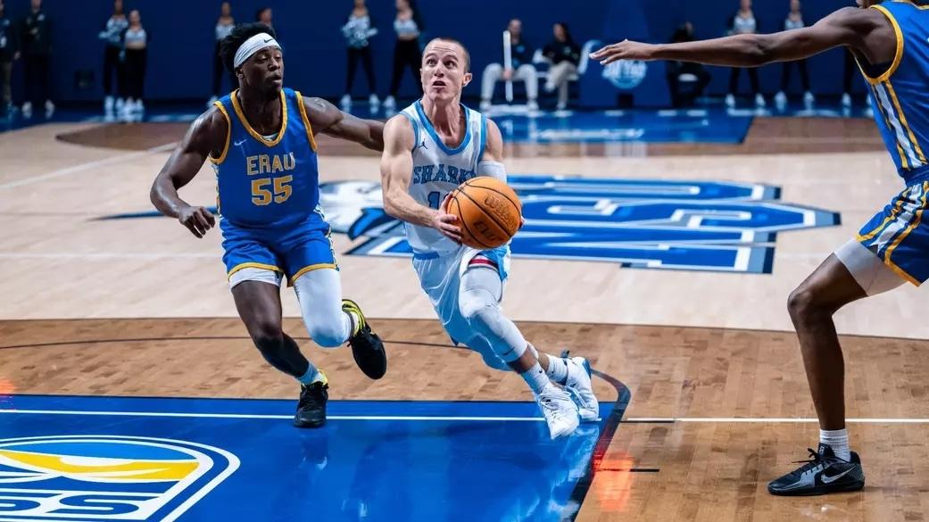 Nova Southeastern's Dallas Graziani drives to the basket.