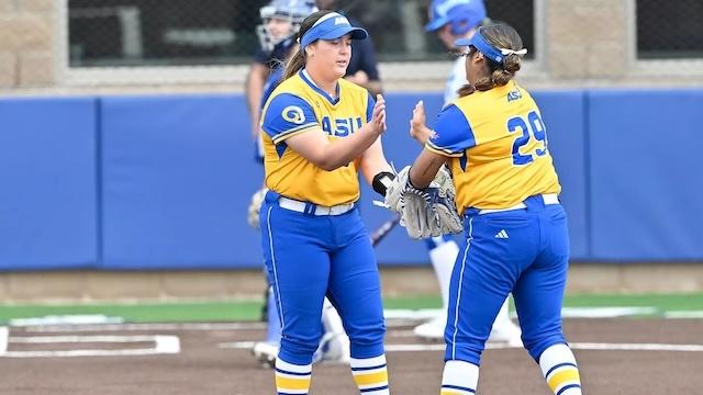 Angelo State gives high fives after another DII softball win.